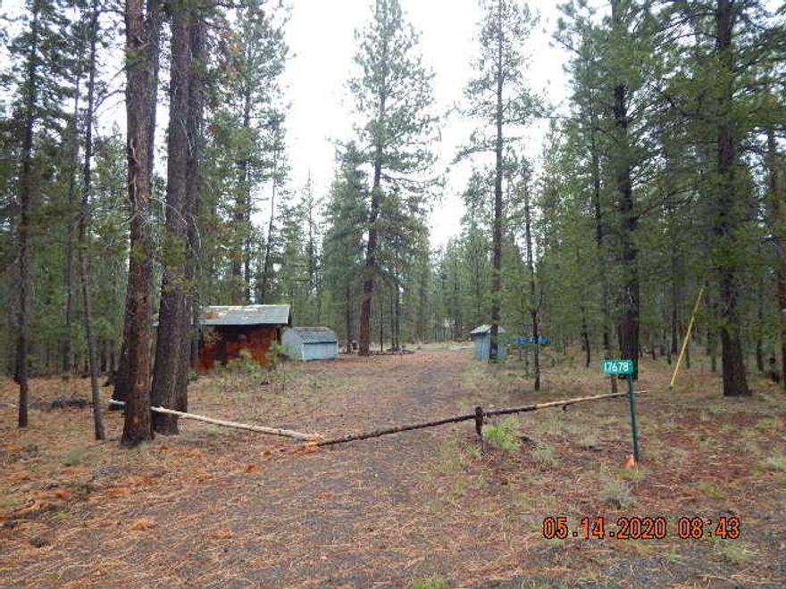 Don't delay on this Newberry Estates gem. Private location at the end of the cul-de-sac.  Has power, well and older septic system.  Double garage with no door, storage shed and well pump house.  Nice cleared lot with driveway.   Older manufactured home was removed.