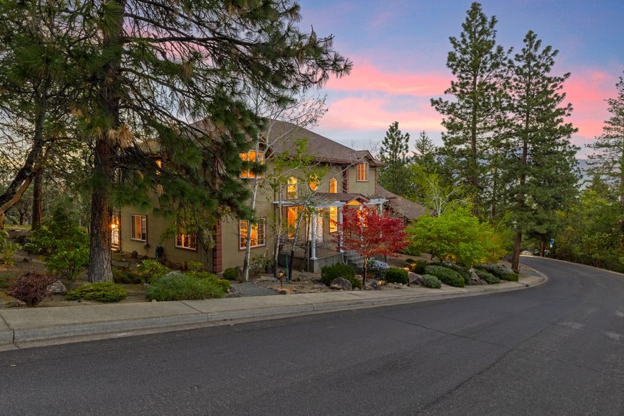 Elegant updated spectacular home w/ great location .40 acre lot w/tall evergreens. Beautiful landscaping w/ large patio, water feature, large covered porch w/views, close to trail system. Dramatic entry w/high ceilings and double-sided staircase w/ open railing & crown molding through out. Wood floors, excluding the bathroom which have tile floors. Library w/wood box beam ceilings and built-in book cases. Formal dining room w/crown molding. Open Chefs kitchen w/dbl ovens, Wolfe cooktop, sub zero fridge, Miele built in espresso, lg island & deep farm sink. Red Dragon counters, wet wine bar off the great room w/ fireplace & large windows. Cozy family room w/built in speakers. Lg master suite w/sitting area & fireplace. Dbl sinks w/granite counters, lg tile shower, separate tub, second master suite. 3 car finished garage w/work area, storage room & RV parking on the side of garage. Beautiful property w/many improvements including a roof in 2016, newer HVAC, dbl on demand water heaters.