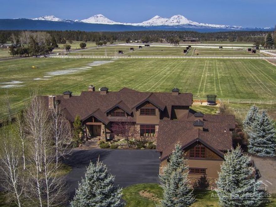 Beautiful Tumalo estate designed to maximize the panorama of the Cascade Mountains, surrounded by horse & hay pastures. Great room, master suite, study & bonus are all on the main. Three additional bedrooms & loft are up, plus a guest studio over the garage. Designed by Rick Wright, the home includes many fine features & upgrades. Wonderful outdoor living in the rear of the home. On 18.75 acres w/16 acres of irrigation, 4 car garage, a barn & storage shed. Peaceful & private yet close to Tumalo & Bend.