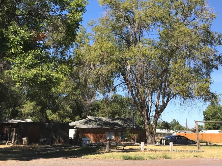 Great corner lot in Prineville zoned for commercial use. Perfect for an investment or business. Existing 1 bedroom, 1 bathroom home provides rental income. 2 storage buildings also on property. Priced to sell!!