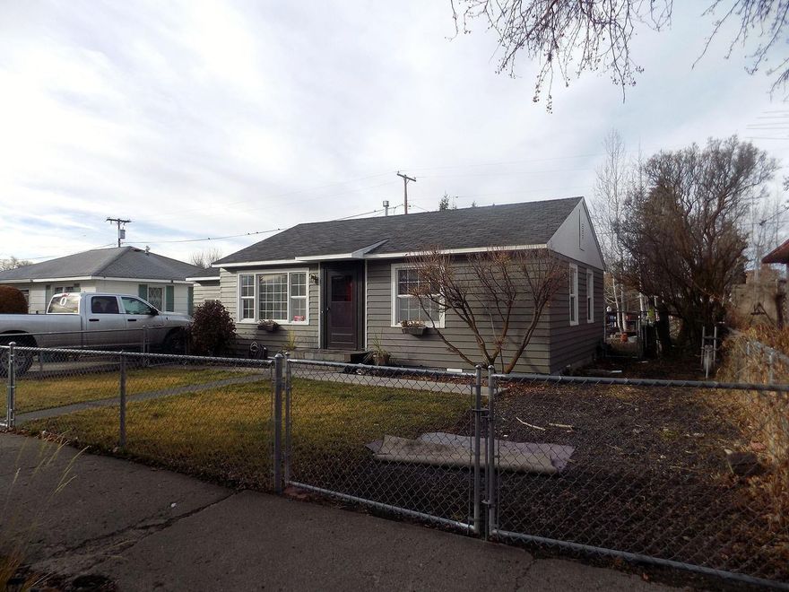 This home has been lovingly lived in for years and is now ready for a new owner. Well designed kitchen with nice counter and cupboard space. The garage has been converted to another room, could be used as a bedroom or family room. The back yard has a nice covered deck, work shed and raised planting beds. Conveniently located near shopping and schools.