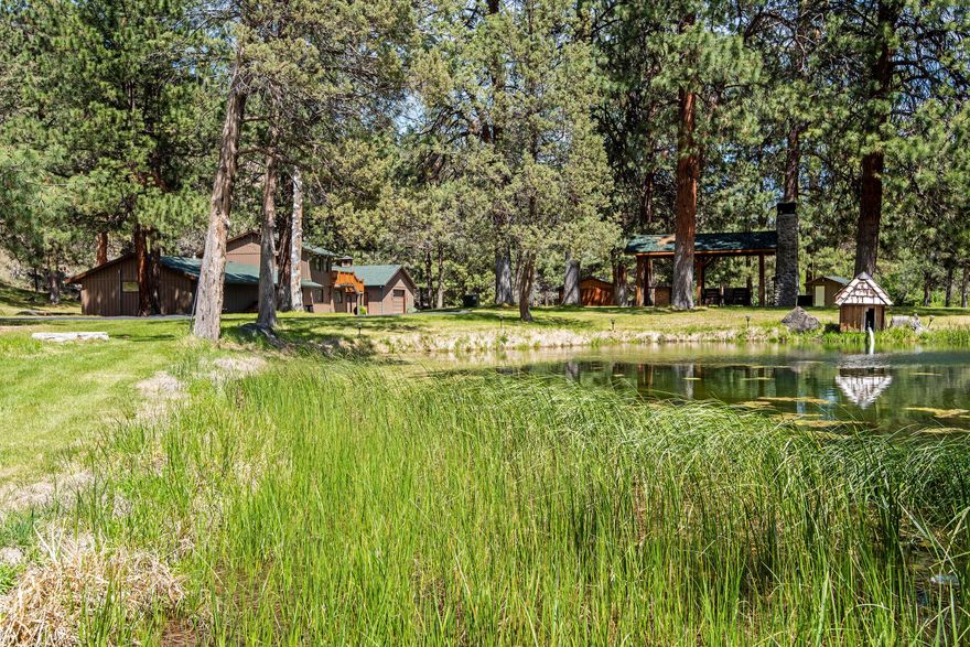 Whychus Creek, 1,500 feet of frontage on 34.33 acres! Tranquil and private one of a kind setting amongst the wildlife, elk, deer and eagles. This 2,718 sq ft ranch home features an interior remodel, 3 bedroom, 2 bath with plenty of room for entertaining! Property runs rim to rim with a creek island, Douglas Fir tree, pines, spruces and aspen. Offers a park like setting, 2.7 acres of water rights, 4 plus acres irrigated grounds with new rain bird control system. Featuring a covered built-in BBQ area near pond with a river rock outdoor fireplace. Pond has a small dock with frequent visits from otters and osprey. 3,600 sq ft shop, paved RV pads with full service hookup. (Septic, 40 amp Electric, Water.) Full basketball court with commercial grade outdoor basketball hoops and professionally painted. (Could be converted to Tennis Courts or Pickle Ball.) Upgraded access road to property. Property adjoins to Deschutes Land Basin Trust trails. Too many upgrades to list!