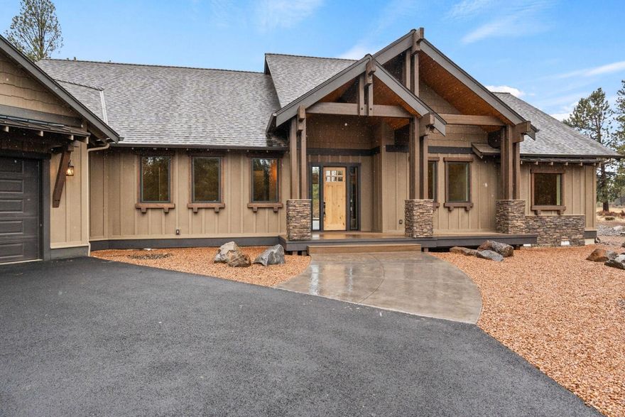 Nestled on 2.5 serene acres in Deschutes County, this stunning 2,817 sq. ft. single-level home offers the perfect blend of privacy and convenience, just 5 minutes from town. Featuring 3 spacious bedrooms, each with its own en-suite bathroom, plus a powder room, this thoughtfully designed home is ideal for comfort and entertaining. The oversized 3-car garage includes a bay large enough for a Sprinter van. The double-sided gas fireplace creates a cozy ambiance, extending to the covered back deck with breathtaking views of the national forest, which borders the property. With landscaping as a blank canvas, there's endless potential, plus plenty of room to add a shop. This is your gateway to tranquil living with the forest as your backyard. Don't miss this exceptional opportunity!