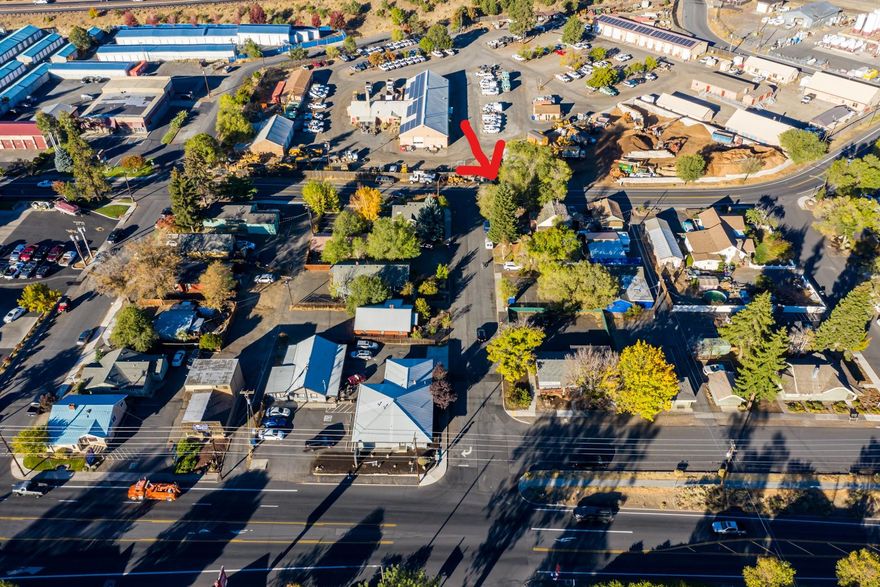 UPDATED INFO: *New Interior photos have been added! 3 bedroom plus upstairs bonus area, additional storage space, basement.  *According to City of Bend, residence can be remodeled OR replaced with legal residence OR changed to commercial use.* This Fixer Upper is in one of Bend's Opportunity Zones. Zoning is CL but current residence is legal,non conforming. Short Term Rental (STR) eligible for Type 1 process per City of Bend. ADU cannot be built. County records shows 4 bed, 1 bath but it is 3 bed, 2 bath plus bonus area. 1326 sq ft plus unfinished 450 sq ft basement. Garage has not been toured. Supposedly there is a bathroom and kitchenette. 
2 blocks from Sparrow Bakery/shops. Approx 1 mile from Old Mill District. Easy access to Hwy 97, shopping, dining and all Central Oregon attractions! Drive by ok but please do NOT enter property or disturb tenant in any way. Call a Realtor for more info.