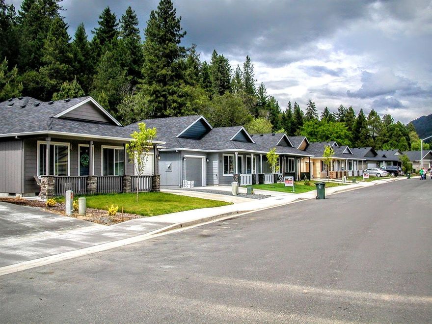 New construction in Rogue River: 3-bedroom/2-bath detached single-family home built by Lori Magel Homes, conveniently located 15 minutes from downtown Grants Pass and 25 minutes from downtown Medford. This single-story home features vaulted ceiling, 4-inch plank flooring and carpeting, and ceramic tile flooring in both bathrooms and laundry. Kitchen features custom cabinets, granite counters, plank flooring, and upgraded stainless-steel appliances. The 2-car attached garage is fully finished and painted, with garage door opener. Vinyl fencing with gate for back and side yards included. Buyer can select colors, finishes, flooring, cabinets, counters, and options. Homeowners association to protect values with a monthly fee of $25.00. Move-in estimated 1/20/2017. Compare quality and value to any other new construction in Southern Oregon.