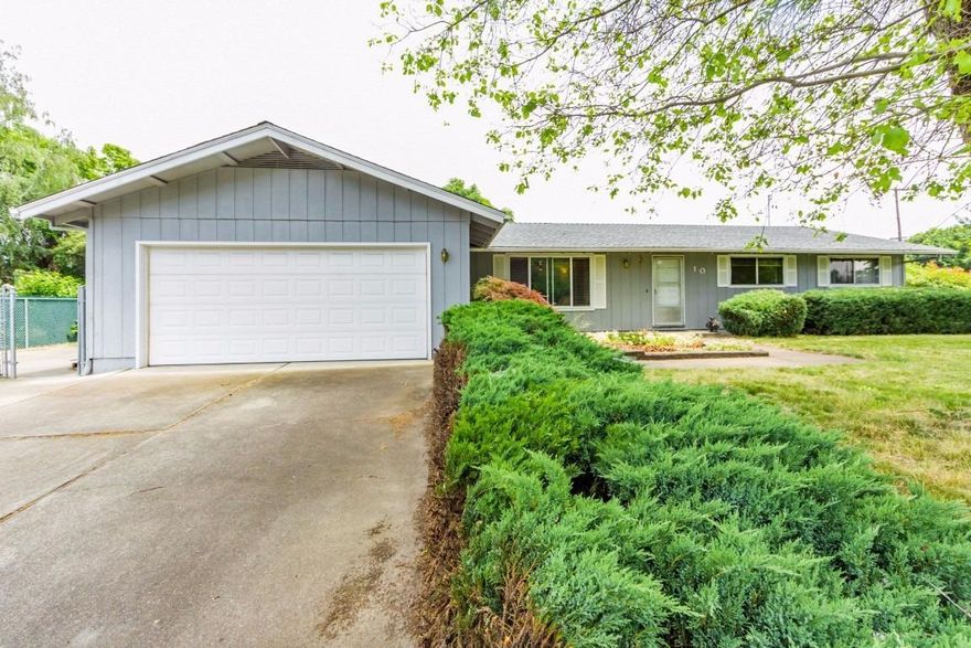 Brand New heating and air system!! Large corner lot with Huge paved RV Parking!! This 3 bed 2 bath home is located in the desirable Mae Richardson School District. Great floor plan with 2 large living spaces, brick fireplace with pellet stove, nice eat-in kitchen with adjoining dining area. Additional features include large covered back patio, newer roof, and guest bath with tile shower surround.