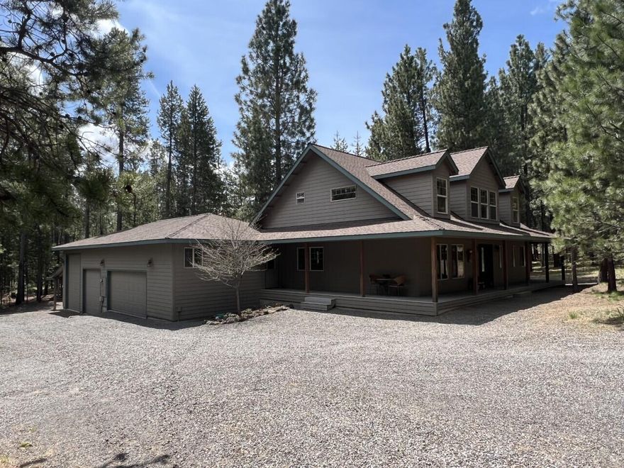 Location, Location, Location. Just minutes to Sunriver, Mt Bachelor and the High Cascade Lakes. Access to the Spring River boat launch see this well cared for custom home that sets on 1.24 acre lot. Private setting looking onto the pine trees and landscaped yard. You enter the home on a covered front porch into the tile entry with a wall of windows looking out to the forest in the vaulted living room. The custom designed kitchen is nice and open with granite counter tops. The main suite is a large room with a wall of windows looking out to the trees and has a large custom bathroom with a double headed shower, tile floors, double sinks, walk in closet. The other 3 bedrooms are upstairs. The second bathroom is also custom designed with tile floors and two sinks. This home has massive amounts of garage space and RV storage! This home has so much to offer and truly is a must see!