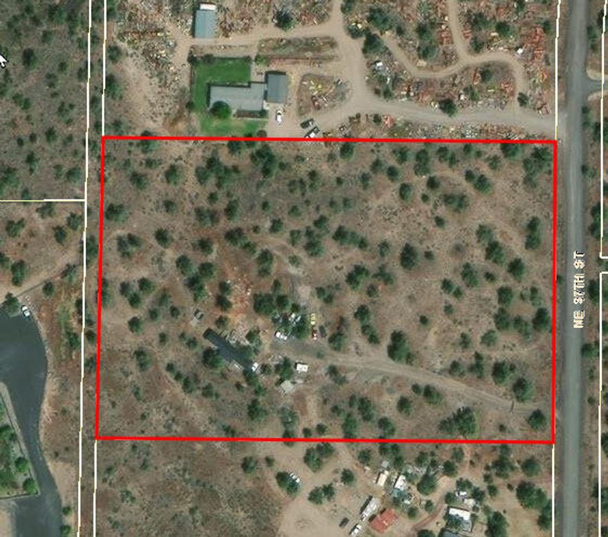 Quiet 5.33ac with fixer manufactured home. Ready for replacement or restoration. Standard septic and shared well. Cash sale only