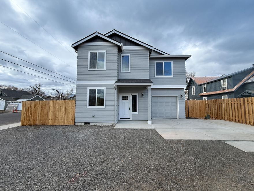 Move-in ready new construction in the heart of Prineville, Oregon and seller offering $5k toward rate buy down or closing costs! This beautifully designed 3 bedroom, 2.5 bathroom home offers modern style and comfort with an open floor plan, cozy gas fireplace, and a stunning kitchen featuring a gas cooktop, quartz countertops, and generous storage. The large primary suite includes an ensuite bathroom with dual vanity, quartz counters, and a spacious walk-in closetâ€”perfect for unwinding. Outside, enjoy a fully fenced backyard & side yard for privacy, plus full landscaping with sprinklers for easy maintenance.
Whether you're a first-time buyer or looking for a low-maintenance, modern home in Central Oregon, this one checks all the boxes. Schedule your tour today and see why this home stands out!