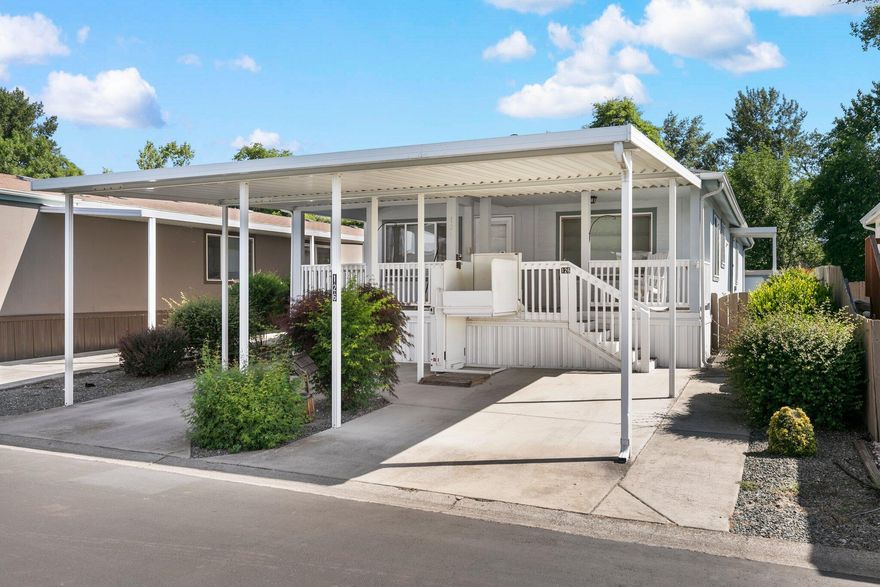 Light and bright, this 3 bed 2 bath charmer located in an all-ages park, Medford Estates, has it all! As you enter, notice the vaulted ceilings, and open floorplan. The kitchen boasts a large pantry, vaulted ceilings, fridge, gas range, and dishwasher. The primary bedroom has dual sink vanity and walk-in shower, accompanied with walk in closets. The guest bath has tub shower combo and linen storage. Outside, enjoy the Covered front and back porches, 2 car carport with lift for wheelchair/walker accessibility. Space rent ($742/MO) includes the use of the brand new clubhouse, pool/spa, playground, pet park, fitness center, meeting room and pool tables. Schedule a tour today!