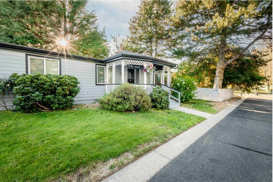 This beautifully maintained 3-bedroom, 2-bath home is located on OWNED PROPERTY in a 55+ community. NO monthly space rent/lease. The property features a new HVAC system, a new water heater, new vinyl windows (installed in 2022), and fresh exterior paint and a fenced yard for Fido. The attached garage provides a covered walkway to the back porch, which is also covered. 
Inside, you'll find a lovely open floor plan, complete with a built-in dry bar in the dining area that leads into a spacious kitchen. The roomy primary suite features a walk-in closet, while the primary bathroom offers both a soaking tub and a separate shower, making it a perfect retreat for relaxation. Low HOA pays water and sewer.
 Don't miss your chance to own this wonderful home!