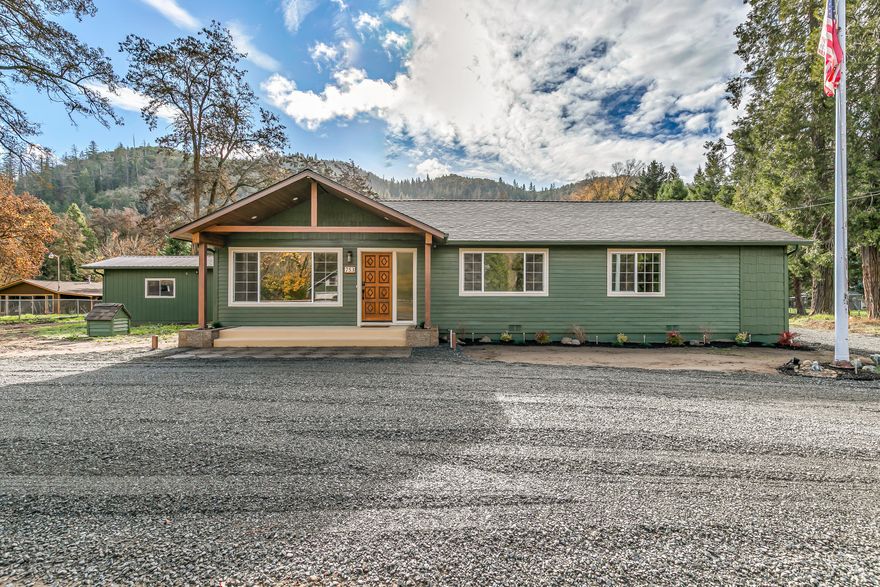 A total of 1,661 sq ft including a 185 sq ft bonus shop space!
This beautifully remodeled 3-bedroom, 2-bathroom home sits on 1.04 peaceful acres directly across the street from the scenic Rogue River in Gold Hill. Originally built in 1945 and thoughtfully updated, the home offers 1,476 sq ft of warm, inviting living space with the potential to easily create a 4th bedroom. Surrounded by mature trees and mountain views, it provides both privacy and a true Pacific Northwest atmosphere.

The property includes a detached garage, pump house, and a versatile shop perfect for hobbies, projects, or additional storage.

Note: The home itself is 1,476 sq ft, plus an additional 185 sq ft from the detached shop, bringing the total usable space to 1,661 sq ft.
