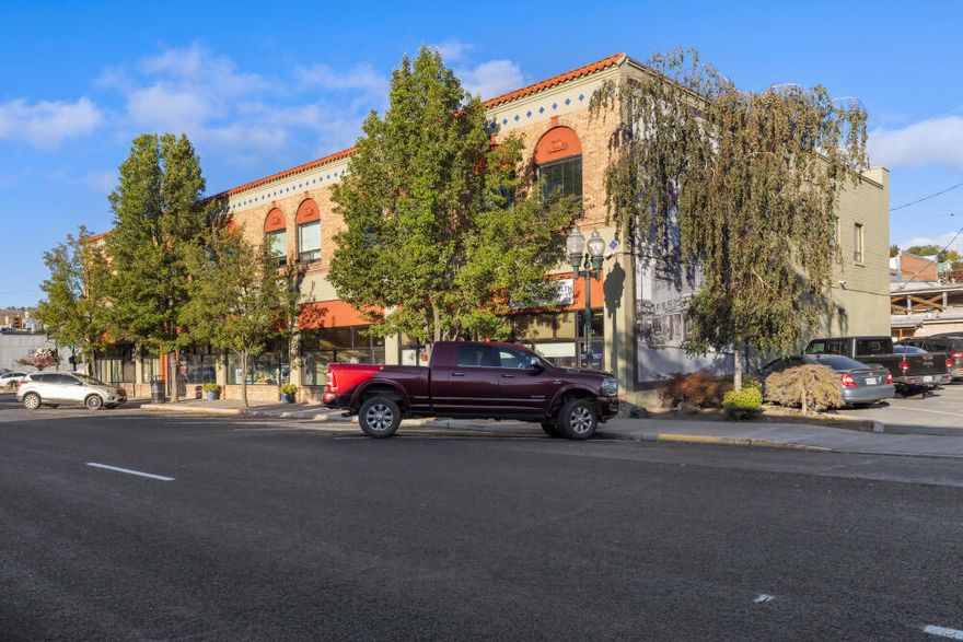 Prime investment opportunity in the heart of downtown Klamath Falls! This fully occupied multi-tenant commercial building offers an excellent mix of long-term tenants including OHSU student housing on the recently remodeled 2nd-floor apartments, plus retail and professional offices on the ground level. Current tenants include a chiropractor, property management company, attorney, insurance agent, and retail shops. The building is in excellent condition with numerous updates including shared elevator.  Beautiful building with strong curb appeal. Included in the sale is the adjacent parking lot on a separate tax lot, providing convenience and added value. With a cap rate of 6.5% and a stable tenant base, this property is a solid addition to any investment portfolio. Please do not disturb tenants.