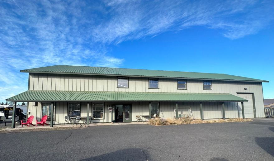 Major price reduction! Excellent investment opportunity situated on a large .53-acre light industrial lot. 
Key Features: Spacious 6,000 sq ft building, 18' vaulted ceilings, 1.5 bath, efficient heat pump, 400 amp service, ample parking. 
PRELIMINARY DRAWINGS PROVIDED FOR A 4500 SQFT ADDITIONAL BUILDING:  (3) 1500 sq ft office/ warehouse rentals. Located in a high-traffic area ensuring visibility and accessibility. Schedule a viewing today!