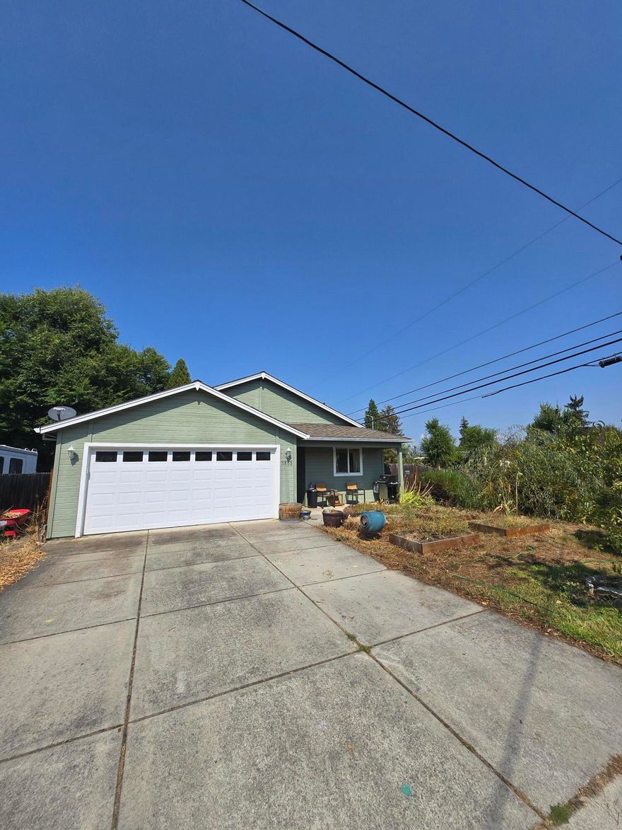 Welcome home to this charming 3 bed, 2 bath property with thoughtful updates and a spacious layout. Inside, you'll find vaulted ceilings, abundant natural light, and a large primary suite complete with a walk-in closet. The kitchen and living areas feature gas appliances and modern conveniences, while recent upgrades include a newer water heater, dishwasher, and an oversized energy-efficient HVAC system—all replaced within the last 2-3 years.

Step outside to enjoy nine raised garden beds, fresh landscaping with new wood chips and growing grass, plus peach and willow trees in the front yard. The backyard also offers a storage shed, and the property includes a 2-car garage. With only one immediate neighbor, you'll appreciate added privacy.

Located just 3 minutes from both an elementary and middle school, this home combines comfort, convenience, and space to grow.