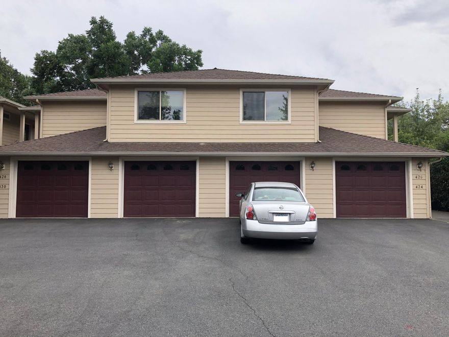 Newer 4-plex consisting of 2 upstairs units each with 2 bedroom, 2 bathrooms, and 1,080 sq ft, plus 2 downstairs units each with 1 bedroom, 1 bathroom, and 676 sq ft (per assessor).  Each unit has a separate address (#424, #426, #428, #430), and each has its own 1-car garage.