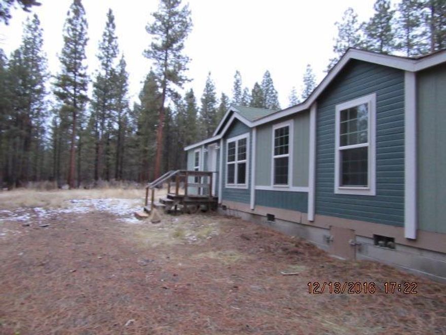 Newer manufactured home on over 2 acres in the pines! Home has some upgrades including new carpet and vinyl throughout. Check the document tab for clear P&D, septic inspection, roof report and water analysis.