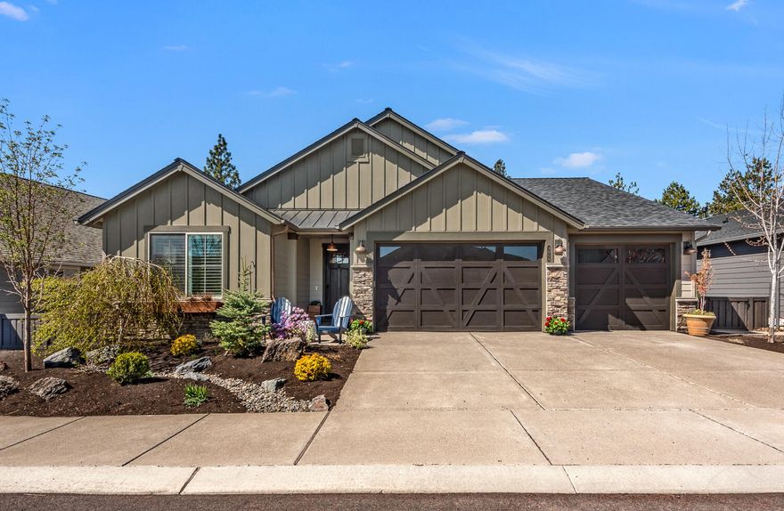 Impeccably upgraded 2,248 SF single-level home with high-end finishes throughout. Enjoy a bright, open layout with a chef's kitchen and stunning butler's pantry featuring quartz counters, soft-close cabinetry, marble penny tile backsplash and custom storage. The living area boasts a shiplap fireplace, floating shelves, added outlets and floor plugs. The luxurious primary suite features a tile walk-in shower, soaking tub, dual vanity and a fully custom closet with built-ins and a shoe wall. Custom designed mudroom, feature wall and upgraded lighting throughout—including statement chandeliers in the foyer, dining area and master bath. Step outside to your private backyard oasis, where a saltwater hot tub, extended paver patio, custom landscaping and low-voltage copper lighting create a resort-like feel perfect for relaxing or entertaining. Oversized 3-bay garage with ample space for vehicles and storage. This home blends comfort, function, and style—designed to impress.