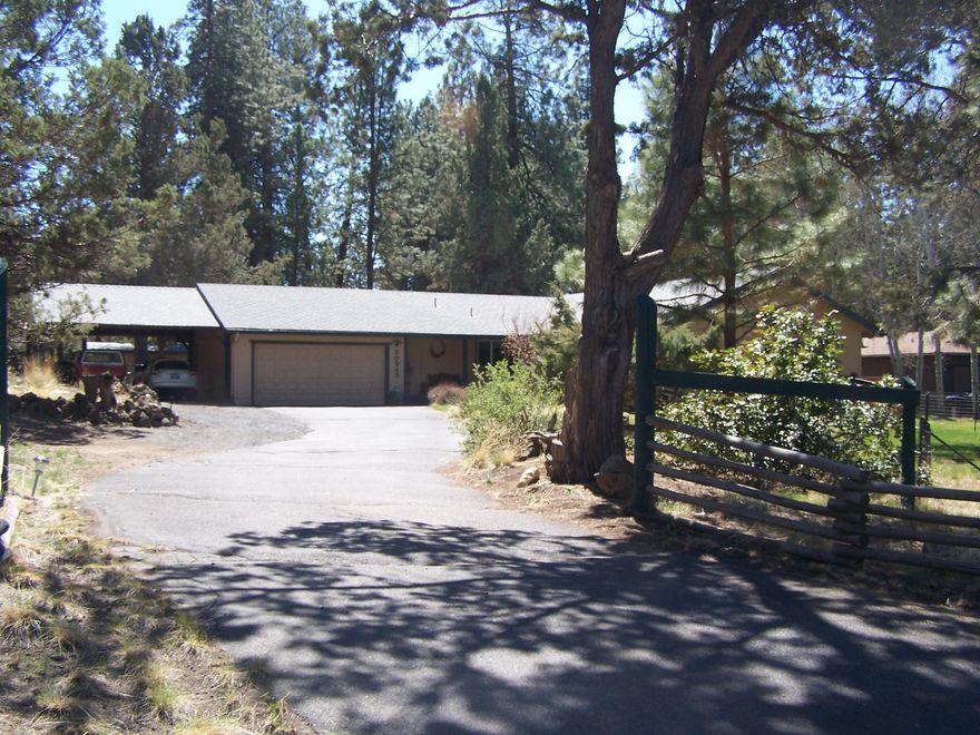 Sellers are Motivated and ready to move! 
  Amazing home on a large lot in the desirable neighborhood of Kings Forest.  This home has 3 large bedrooms and two baths, lots of extra storage in the closets. Kitchen is light and bright with many cabinets, DBL sink and a wonderful large walk in pantry for all your goodies, also a large laundry room with lots of shelving. A very comfortable living room with a wood beam ceiling and wood burning fire place for those cozy cold romantic nights. Outside you have an attached 2 car garage and a 2 car carport, sprinklers in both the front and the side of home.  The gorgeous  back yard is an entertainment delight with a firepit area, storage shed, lots of firewood included too, a covered porch both in front and back for your morning coffee as you watch the Deer walk by. This home is a must see and ready for your own personal touches. Call Today for an appointment.