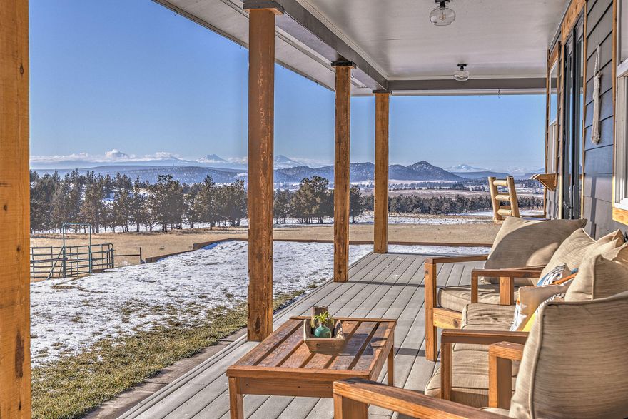 Located in Prineville, this property features some of the most amazing Cascade Mountain views, enjoyed from every room of the completely updated modern farmhouse. Sitting on 164 acres & just minutes to town, the 2,656± square foot, 3 bed, 2.5 bath farmhouse has all the right touches, including an open floorplan with high ceilings, exposed wood beams, immersed in natural light. The kitchen features subway tile backsplash, 2 convection ovens, wine refrigerator, quartz countertops, butcher block island, & more. This property also includes a 2 bed mother in law quarters, also completely updated with farmhouse finishes, perfect for out of town guests or multi-generational living. This space also makes an excellent work from home office suite, set away from the main house, allowing for minimal distractions. Additional improvements include a nice shop with meat processing room, large hay barn, vet/tack room, chicken coop,  working corrals, EV charge stations, 2 LOP tags.