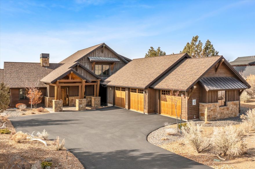 Northwest style home with panoramic views of the Cascade Mountain range and those priceless Brasada sunsets. Inside you will find a thoughtful open plan living space and a kitchen perfectly designed for entertaining and gathering around the expansive island.  The great room features a beautiful masonry fireplace flanked by custom built-ins, rising to meet the natural wood ceiling. Large sliding glass doors allow you to gaze outside to the stone fire pit and the picturesque Cascade Mountain backdrop. Rich and sturdy beams accentuate a spacious covered patio and lends itself to an uncompromised outdoor living experience here at Brasada Ranch. The primary bedroom is on the main floor with a spacious walk-in closet and master bathroom. On the second floor, there are two additional bedrooms each with ensuite bathrooms. An oversized three car garage offers plenty of storage possibilities and completes this ideal home.