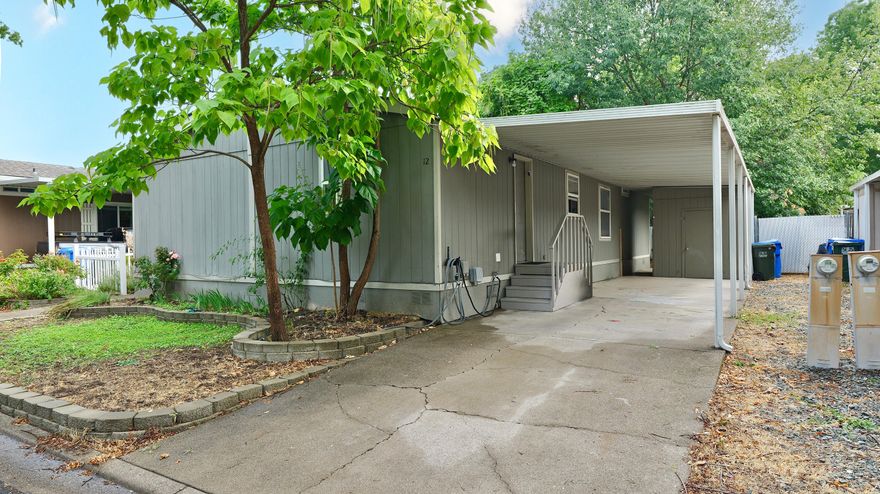 Cute, affordable, and move-in ready!

Step inside to an open floor plan featuring a spacious living room with a cozy electric fireplace. The country-style kitchen offers an island, pantry, and ceramic tile countertops, with a large dining area perfect for gatherings.
The king-sized primary suite includes a newly updated oversized shower, large closets, and plenty of space to relax. You'll love the updated wood-grain vinyl flooring throughout, plus the convenience of a laundry room right off the kitchen. Outside, enjoy a private fenced backyard, storage shed, and carport. Located in Butte Crest Park, this home is the perfect blend of comfort and affordability.