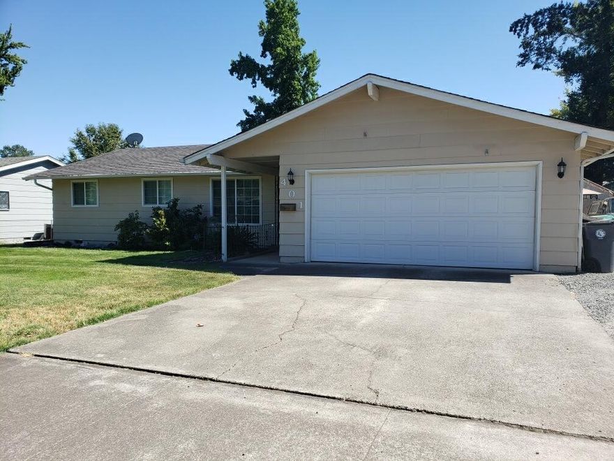 This 3 bedroom, 2 bathroom property is an excellent opportunity for a first time home buyer. With a huge back yard, small RV parking and both a living room and family room, it is a great set up both inside and out!