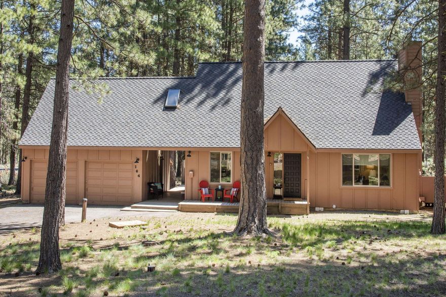 Well-maintained Black Butte Ranch home on a private half-acre lot backing to National Forest land. This classic retreat blends original BBR charm with thoughtful updates throughout. The fully equipped, remodeled kitchen and  bathrooms feature quartz countertops and white shaker cabinets. A newer heat pump, cozy wood stove, and central AC provide year-round comfort. A 50-year presidential roof was  installed in 2024. The oversized two-car garage offers plenty of space for vehicles and outdoor gear. Ideally located near the Glaze Meadow Rec Center with indoor/outdoor pools, spa, fitness center, and golf. Additional resort amenities include 18 miles of bike paths, tennis and pickleball courts, horse stables, restaurants, and two championship golf courses. Just over two hours from Portland and a short drive to Sisters, Hoodoo Ski Area, and Black Butte hiking trails. A turnkey retreat located in one of Central Oregon's most sought-after communities.