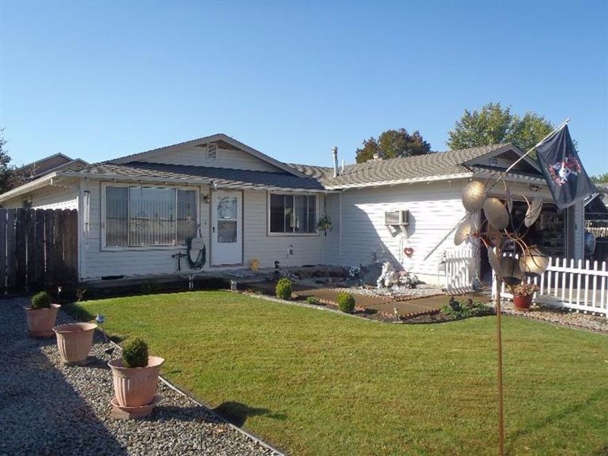 Great location and charm come to mind when viewing this well-kept 1975 home. White picket fenced front yard greets you on your way into your new home. 3/2 that is clean with fresh paint, kitchen and dining room offer real hard wood flooring, new countertops in 2009, skylight that opens, 2013 dishwasher. Plenty of daylight gets into the living room and each area of the home. The large family room has a wonderful wood fireplace for those winter nights. Master bedroom slider lets you out to the 17' x 33' gunite in ground pool area. Fully fenced back yard is perfect for the outside activities. Enjoy the attached 9' x 17' solarium that leads to the pool area as well. With new roof in 2010 and new furnace in 2004, new hot water tank, 30 year vinyl siding installed in 2004, new pool pump in 2004, new pool pump in 2004, bring your RV, move in and relax.