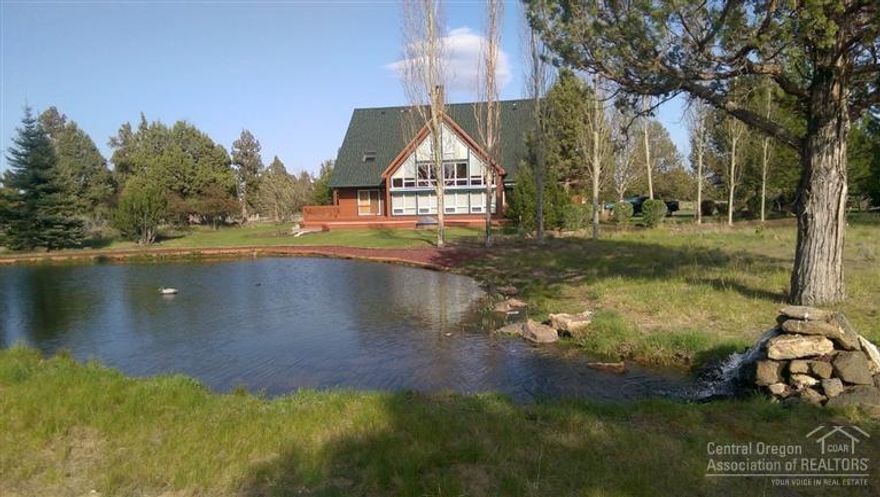 Welcome home to a private ranch with over 38 acres bordered by approx. 800 acres of BLM land that has many miles of riding trails. This ranch of distinction creates your very own a private sanctuary. Yet this sanctuary is only five miles from shopping such as Costco and Safeway. The gated entrance leads through an irrigated pasture to a carefully crafted Northwest style home that is perfectly suited to Bend. A mixture of a working horse ranch, and a country retreat for the discriminating horseperson!