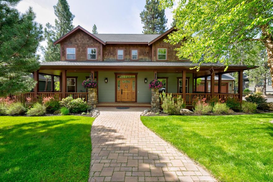 Backing up to forested land, this beautiful craftsman home provides serenity and privacy. Attention to detail is apparent with beautiful iron accents to the warm and cozy wood finishes. Built-in shelving surrounds the stunning floor to ceiling river rock fireplace in the great room. Kitchen boasts granite countertops and stainless steal appliances, including the SubZero refrigerator, Thermador oven and cook top. Large downstairs primary on-suite with access to back deck and hot tub looking out to the mature Ponderosa Pines. Heated tile floors in primary bathroom will keep you warm while you enjoy relaxing in the claw foot tub and glass block shower with dual heads. Upstairs bedrooms have their own bathrooms and walk-in closets. Third bedroom has bonus loft for sleeping or storage.  Plenty of storage option above garage, and off of third bedroom. This home is waiting for you. Call for an appointment today.