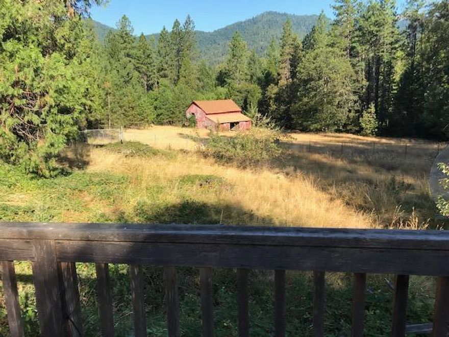 Private, end of the Road, backs to BLM, 40 acres, zoned WR.  Rustic log home,  barn, Large enclosed, open air arena.  Rolling pastures, timber land, several ponds, seasonal Crk, excellent well.  
Property is being sold ''as is'' and will not finance.  Buyers must be qualified and appointment made with listing broker.