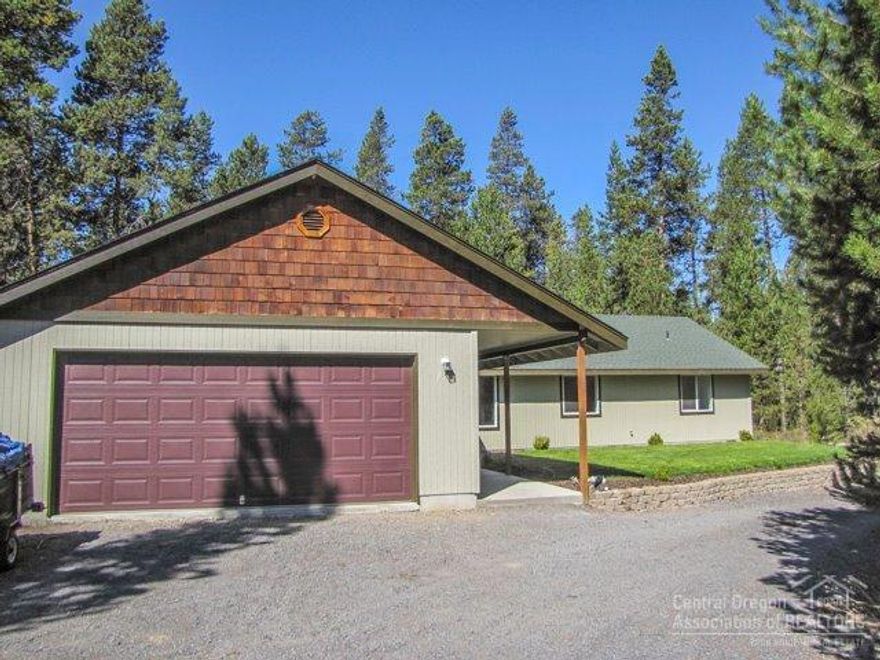 Single level & clean-as-can-be, 4bed 2bath on over an acre, not far from town. Stick-built home is move-in ready with many extras. Property Features: high ceilings & large windows, generous master suite with his/hers walk-ins, large-private lot, 30ft+ deep 2-car garage, storage shed w/ carport, convenient pull-thru driveway, new int/ext paint, and new-covered back deck*. Property has ample room in & out for all you need. This is well worth a look!