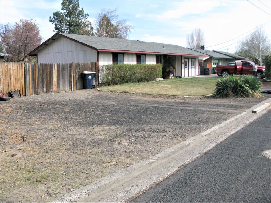 Located on a massive lot in Redmond, .27 of an acre, with lots of room for RVs and more! Zoned R3 and has many options. 
3 bedrooms, pellet stove for heat and a sweet Koi pond in the back yard!!!
Sitting approximately 2 blocks from Umatilla baseball fields!
Will not finance, Cash sale only.