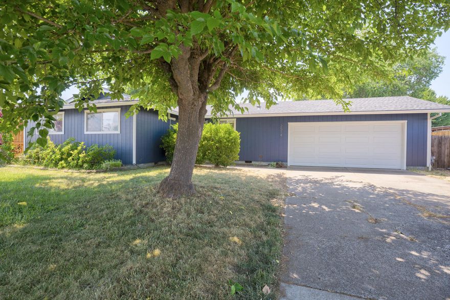 Welcome to 2514 Carr Street in White City—a beautifully updated 3-bedroom, 2-bathroom home ideal for first-time buyers or those looking to downsize. This well-maintained single-level home features a brand-new roof and gutters, fresh exterior paint, ductless heating and cooling, and durable vinyl plank flooring throughout the interior, offering a clean and modern feel. The bright and open living space flows into a functional kitchen and dining area, perfect for everyday living or entertaining guests. Outside, you'll find a large backyard with plenty of room to garden, play, or relax. Conveniently located just minutes from Highway 62, this home offers easy access to Medford, shopping, schools, and local parks while still enjoying a quiet neighborhood atmosphere. Whether you're starting your homeownership journey or simplifying your lifestyle, 2514 Carr Street is move-in ready and waiting for you. Schedule your private showing today and come see all this wonderful home has to offer.