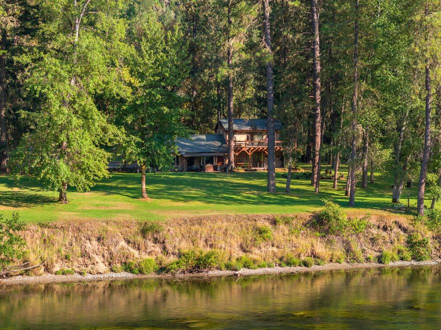 Along the Wild & Scenic Rogue River, lies the Randall Ranch! LIVE WATER has become desire #1, & this exciting offering provides a fantastic stretch of river that runs for just over a 1/4 mile of the majestic Rogue River. Located near the town of Grants Pass, the area boasts a small-town culture, a mild climate, recreational abundance, & the renowned Rogue River. There is a level, usable landscape with ample space for outbuildings and other improvements, plus the adjacent public lands add 600+ acres of recreation & room to adventure.  The home offers a rustic charm & is set back from the river while retaining a gorgeous water view from both the patio & the second story balcony- the lawn rolls right to the river's edge.  The versatile zoning of the property combined with its prime location & waterfront, offers abundant potential! Experience the serenity today - with towering trees, a rising topography to the south & the Rogue River come together to make this a one-of-a-kind destination!