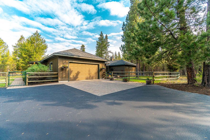 If you are looking for privacy, tranquility & some elbow room, this is the perfect retreat! Just 10 minutes from Sunriver, Pinewood Country Estates is a neighborhood of 10+ acreage lots. Enjoy single level living at this 3 bedroom (2 suites), 3 bath retreat. The great room offers a Mt Bachelor view & wood burning FP plumbed for gas, and the home has A/C . Your new estate features a Chef's delight for a kitchen! Stainless steel appliances with double ovens & warmer, Insta-hot water, wine cooler & ice machine, large pantry & large center island w/ plenty of prep space & extra seating. Bonus room off the kitchen offers a view and is flexible as an office, media area, reading nook or hobby room.  Spacious deck area boasts the best mountain view! Pet fence at house. Detached 1,700 sq. ft. heated shop w/ second level storage & office area; separated 768 sq ft guest living quarters on the main level. This is horse property & so much more! Come check it out!