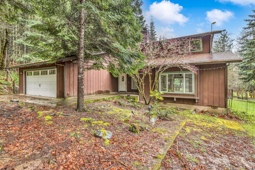 43 acres-2 dwellings in beautiful Sunny Valley!
Cozy up in the NW Style home that has 3 Bed/2 bath with wrap around cook's kitchen and 2 car attached garage. Behind this home is a fenced yard with a patio deck perfect for entertaining. 2 bed/1.5 bath guest quarters with attached garage and a vaulted porch are perfect for enjoying morning coffee overlooking the terrain- also with a fenced yard with raised garden beds. Landscape around the homes is indicative of the redwood/coastal terrain and is gorgeous being backed up by BLM land. Each place has its own propane generator with 500+gallon tank. There are 2 RV hookups, Pastureland, fencing, 50+ raised garden beds with drip systems, and multiple ponds. Seasonal creek runs through your property and Graves creek runs along the properties border. Legend says there was a personal air strip there in the 70's. 2 huge warehouses, several shops, fenced and cross fenced areas make this the perfect place for anything you can dream of.