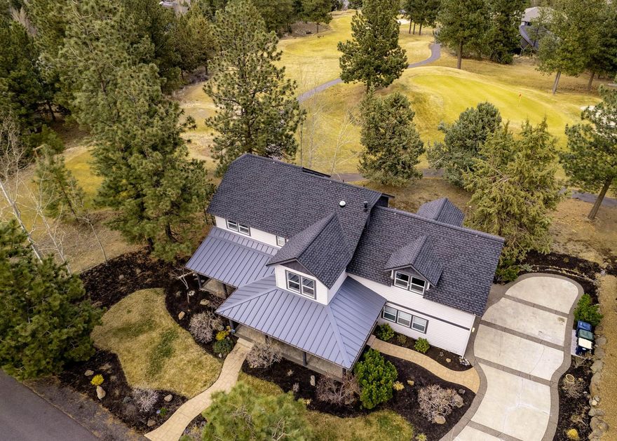 Desirable 2-story in the highly-sought-after Rivers Edge Subdivision, with sweeping Easterly views.  Meticulous attention-to-detail, quality craftsmanship, luxury finishes throughout.  Generous use of windows fills the home with natural light.  Thoughtfully designed floor plan is so livable featuring wonderful use of stone, woodwork, and smart-home integrations.  Impressive floor-to-ceiling stone fireplaces in the living area and primary suite are natural gas.  Quality features will delight you, all in up-to-the minute style.  Magnificent gourmet island kitchen perfect for family and entertaining.  Impeccable 4-bedroom on the 14th tee of the Rivers Edge Golf Course, larger 0.33 acre lot with grand views down the greens.  Expansive deck has room for everyone.  Situated on quiet street with treed privacy, established landscaping, and lovely sunrises.  Ideally-located close to Deschutes River Trail, Sawyer Park, shopping, restaurants.  Call now, you will love to call this your new home!