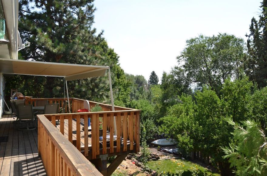 This is a one of a beautiful property! Almost 3,100 Square feet for less than $270,000. The big beautiful deck has views of the city year round, and Shasta in the fall and winter! This home boasts an open floor plan from the kitchen, to the eat in nook, to the great room! It also has 2 fireplaces to help keep you warm in the winter. The master has beautiful hardwood and a huge walk in closet, and its bathroom has separate sinks with a nice walk in shower! The second bedroom upstairs also has its own full bathroom! The downstairs has another living room bonus room, and is divided by a beautiful brick design. There is a trophy room or shop downstairs as well that could be used as an office or den. There are also another 2 bedrooms downstairs and a full bathroom. The owners have done all of the landscaping themselves and the back yard is tiered. It has a private fire pit and an outstanding custom built treehouse fully finished!! The opportunities with this property are endless!