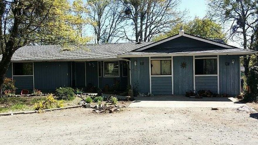 With a little TLC this home will shine once again! Located off of three pines on a private road is this 3 bed/2 bath home with a two car detached Garage. Open living room with kitchen and dining that leads to your outside deck with views of the mountains. Garden areas, room to play and storage will be an attractive feature. Will look at any reasonable offer so don't be shy on this one. Make an appt to see this one and put in your offer.