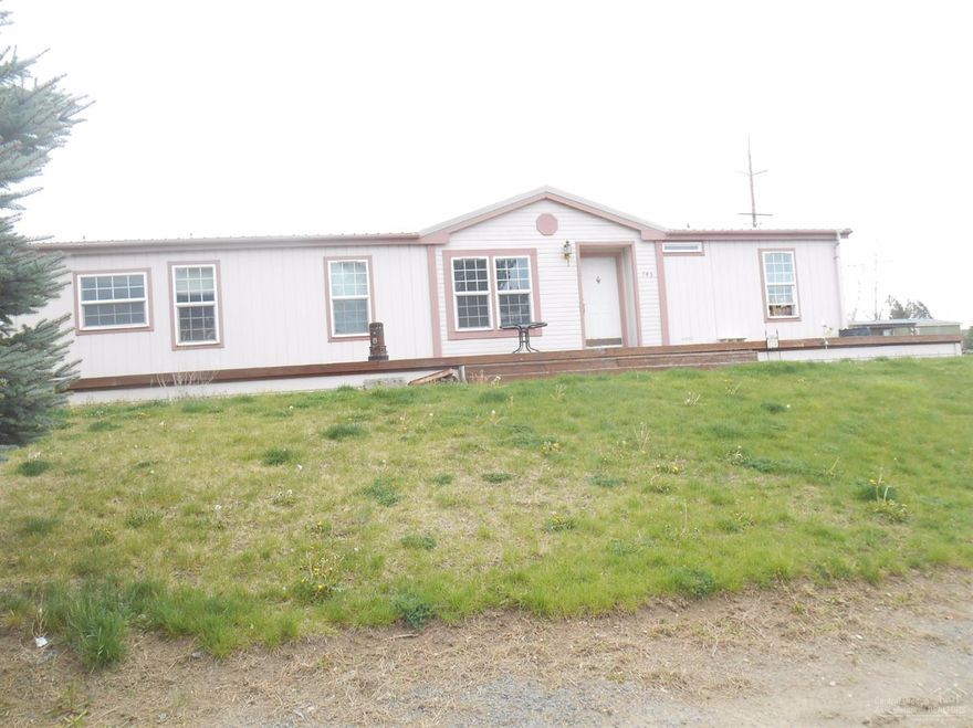 A well kept manufactured home featuring three bedrooms, two full baths, 1512 SF, corner lot with easy access and a storage building.