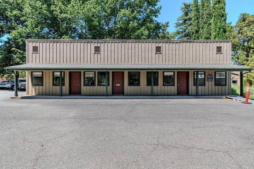 Professional Office Building with 4 suites, 2 bathrooms and kitchen.  Each suite has an exterior entrance.  Three suites have 2 private offices with a large office / reception area.  Paved parking for 9 spaces with additional 10 parking spaces available in adjacent gravel area.