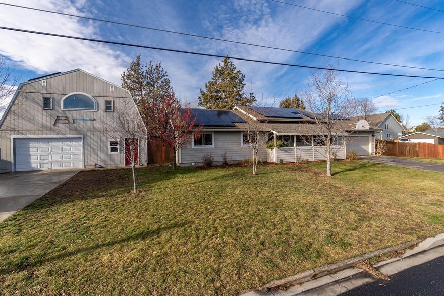 Looking for a spacious 952 Sq Ft fully insulated + concrete floors SHOP/Garage? Welcome to 1511 SW 21st Place. A 3BDR, 2BA, 1501 Sq Ft, single level home situated on a 0.32-acre, double lot in SW Redmond. Home features an Open floor plan, vaulted ceilings, Shower/tub combo. Maple cabinets, Kitchen breakfast bar, ceiling fans, laminate counters, dining area, pantry, Primary bedroom on the main, heat pump, Attached 2 car garage, w/ample street parking. Owned SOLAR panels for low utility costs! Fully fenced backyard w/large garden area. Enjoy Hot tub off back deck. DETACHED separate, ready to set up SHOP/GARAGE, RV space or bring all your TOYS! (Motorcycles, Classic cars, boats). Potential ADU buildout above SHOP/Garage building. Possible RV parking next to Shop Building. You'll enjoy excellent access to schools, shopping, Dry Canyon Trail and Quartz Park. Don't miss out on this opportunity!!