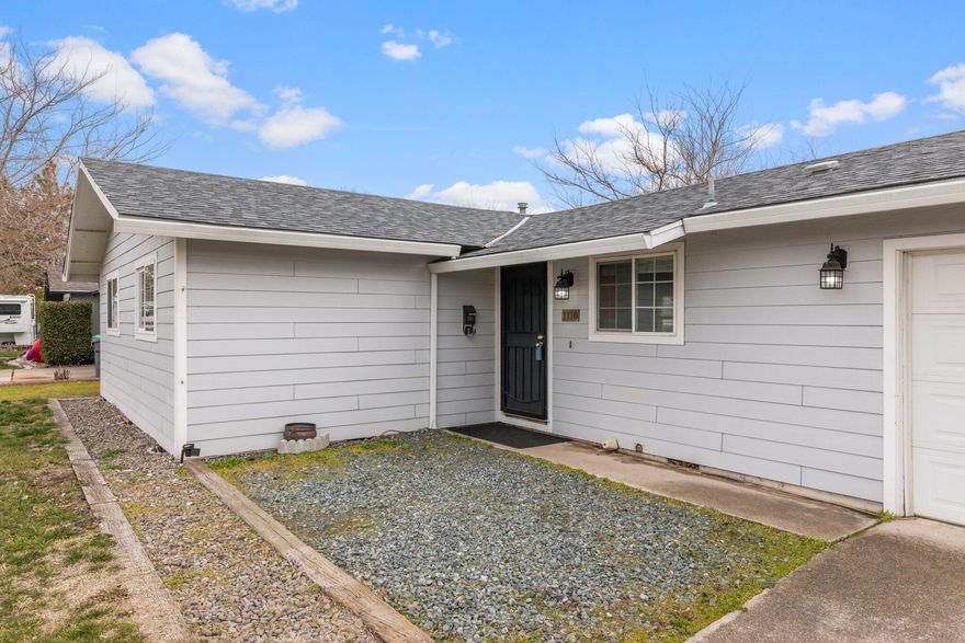 Nice starter home in Central Point with 3 bedrooms and 2 baths.  Clean older home includes a gas range/oven, microwave, garbage disposal and dishwasher.  Separate laundry area, family and living room.  County shows 1172 Sq. Ft, however the garage was enclosed for extra living space totaling over 1400 sq.ft.  Large covered patio area and fenced backyard with garden shed.  Some upgrades were done to the home.  There is parking available for an RV and sale includes a home warranty.  This home is sold by personal representative AS IS.