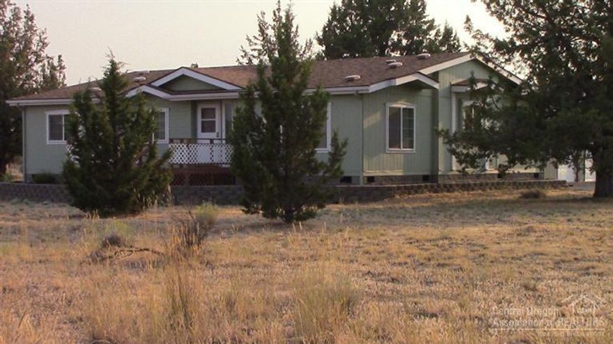 This property has it all! New interior paint, new carpet, handicap accessible, 3 bay garage with work area and shop. There is a fenced garden area on a flat lot that could make a nice horse property. Easy care landscaping is in place and the property is close to the entrance of Crooked River Ranch. Enjoy all the amenities the Ranch has to offer; golfing, tennis, disc golf, pickle ball, saltwater pool, miles of trails and the best fishing around.