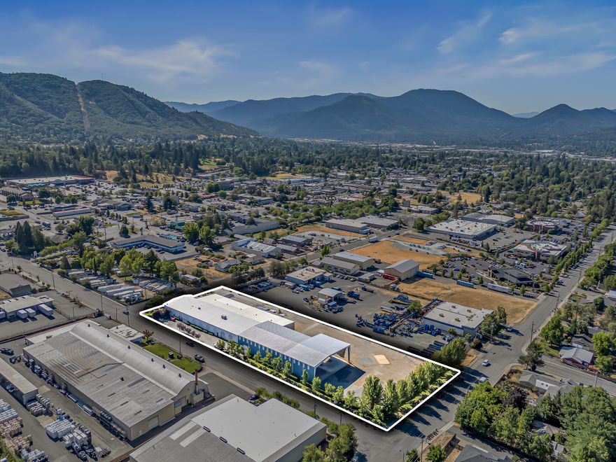 Strategically located in North Grants Pass's industrial core, this 20,200 SF facility on 2.44 acres offers exceptional accessibility just off I-5. Featuring ±6,000 SF of office and a fully insulated, sprinklered, heated/cooled warehouse, the property includes three ground-level doors, a split dock-high door, tall exterior awnings, and a secured fenced yard. Currently partially leased to Platt Electric, it's ideal for investors or owner-users seeking flexibility and income. Just minutes from downtown, Redwood Hwy, and the Southern Oregon coast. Also offered for lease. Contact Broker for more information.