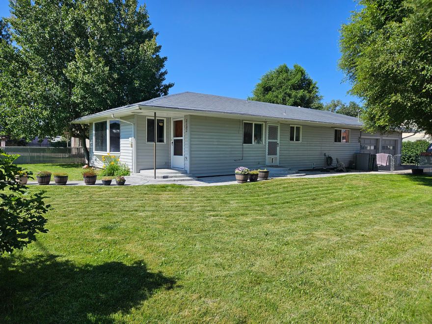 Conveniently located in Klamath Falls is this well  maintained one level home that features 2 bedrooms and 2 bathrooms, plus a bonus room of 400sf that is not included in the GLA. this enclosed patio could be turned into a 3 bedroom or home office, hobby area, you decide.  This bonus space has plenty of windows to let the sun in an exterior door that leads to the back patio.  This comfy home is on a corner lot with a fenced yar, in-ground sprinkler system with KID irrigation, a 2 car garage with shop area and the driveway is paved and wide enough for several vehicles.  There is also three additional sheds for garden tools, projects or storage.  Easy to show, motivated seller