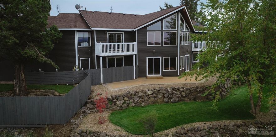 Great opportunity to own a beautifully remodeled 3,812sq ft custom home w/amazing panoramic views elevated high at back of property overlooking the Cascade Mtns & Smith Rock, over 20 private low maintenance acres backing countless miles of BLM trails, 2,880sq multi use barn, shop, 4H Building with new HVAC system, floor drains & private septic. Home has mstr on main level w/private deck, 3 car garage, 2nd shop by house, new roof, vaulted tongue & grove ceiling, new SS appls, granite, quartz & concrete counters, newer paint in & out, beautiful hardwood, concrete, tile, & carpet floors, new radiant floor heating system, huge great rm downstairs w/bar & kitchen, concrete driveway, immaculate landscaping, showpiece water feature, custom archway entrance. Deschutes River just 2 miles away & close to Eagle Crest's amenities!