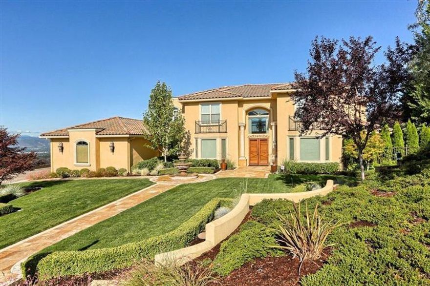 Spectacular Mediterranean home with forever views! Home was built by Michael Pagnini & has amazing amenities & attention to detail. Everything you could want in an executive home, 6,231 sq.ft.w/4bdrms4 1/2bth on 1.22 ac, lrg office upstrs & beautiful office dwnstrs.There is a grand foyer & a formal dning rm w/travertine & wd inlaid flooring .Formal living rm w/flr to ceiling windows & fantastic mt.,valley & city lits views. Chef's ktchn w/4 sided glass display cabinet, granite, blt in frig& full sz freezer. Dble sided fireplace btwn kitchen & family room which leads to outdrs w/ solar heated,salt water infinity edge pool w/electric cover & sunken hot tub, lrg gas frepl w/inviting seating area all under splendid gazebo/lovely patio perfect for parties!This home also has 4 car gr. w/2 walls of storage cabinets ,awesome hm theater rm.w/surround sound & 966 btle wine cellar SEE ATTACHED LIST OF AMENITIES This home is truly extraordinary & the views are exceptional! You will be awestruck